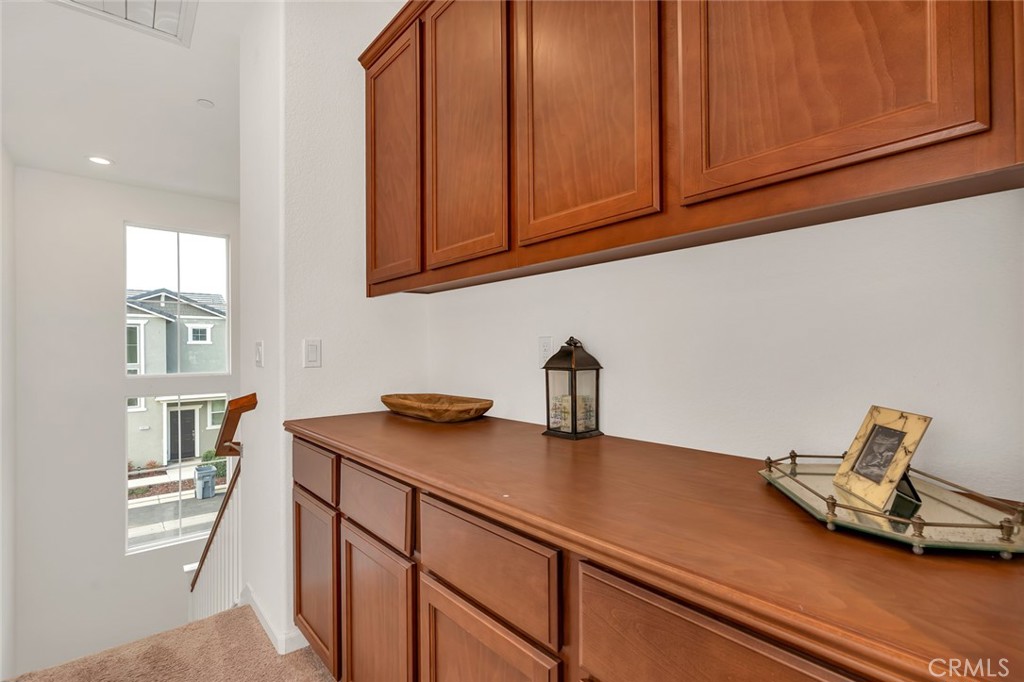 2936 Dillon Lane Merced, CA 95348 - Photo 28 of 34 a kitchen with cabinets and window