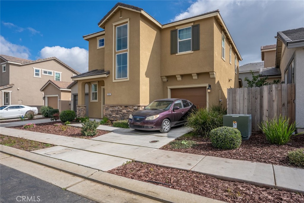 2936 Dillon Lane Merced, CA 95348 - Photo 33 of 34 a front view of a house with garden