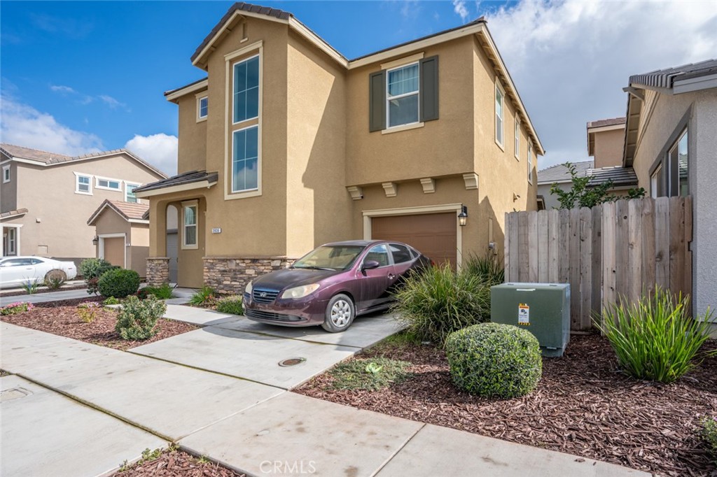 2936 Dillon Lane Merced, CA 95348 - Photo 34 of 34 a front view of a house with a garden