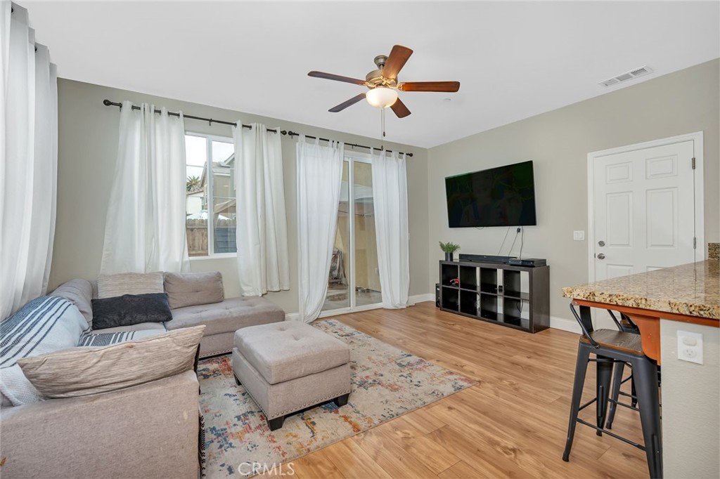 2936 Dillon Lane Merced, CA 95348 - Photo 4 of 34 a living room with furniture and a flat screen tv