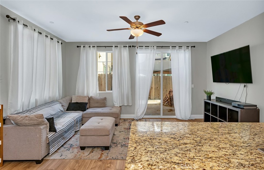 2936 Dillon Lane Merced, CA 95348 - Photo 8 of 34 a living room with furniture and a flat screen tv