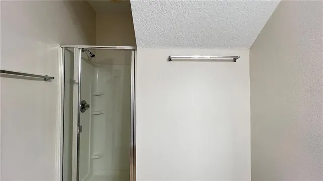 a kitchen with a sink and a stove top oven