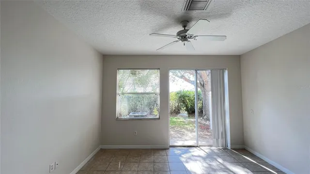 a kitchen with stainless steel appliances a refrigerator and a stove top oven