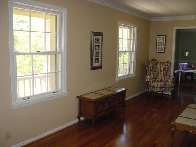 2007 Hartland Road Franklin, TN 37069 - Photo 3 of 14 Living room leads you to the formal dining room (currently being used as a "play area") with hardwood floors & crown molding.