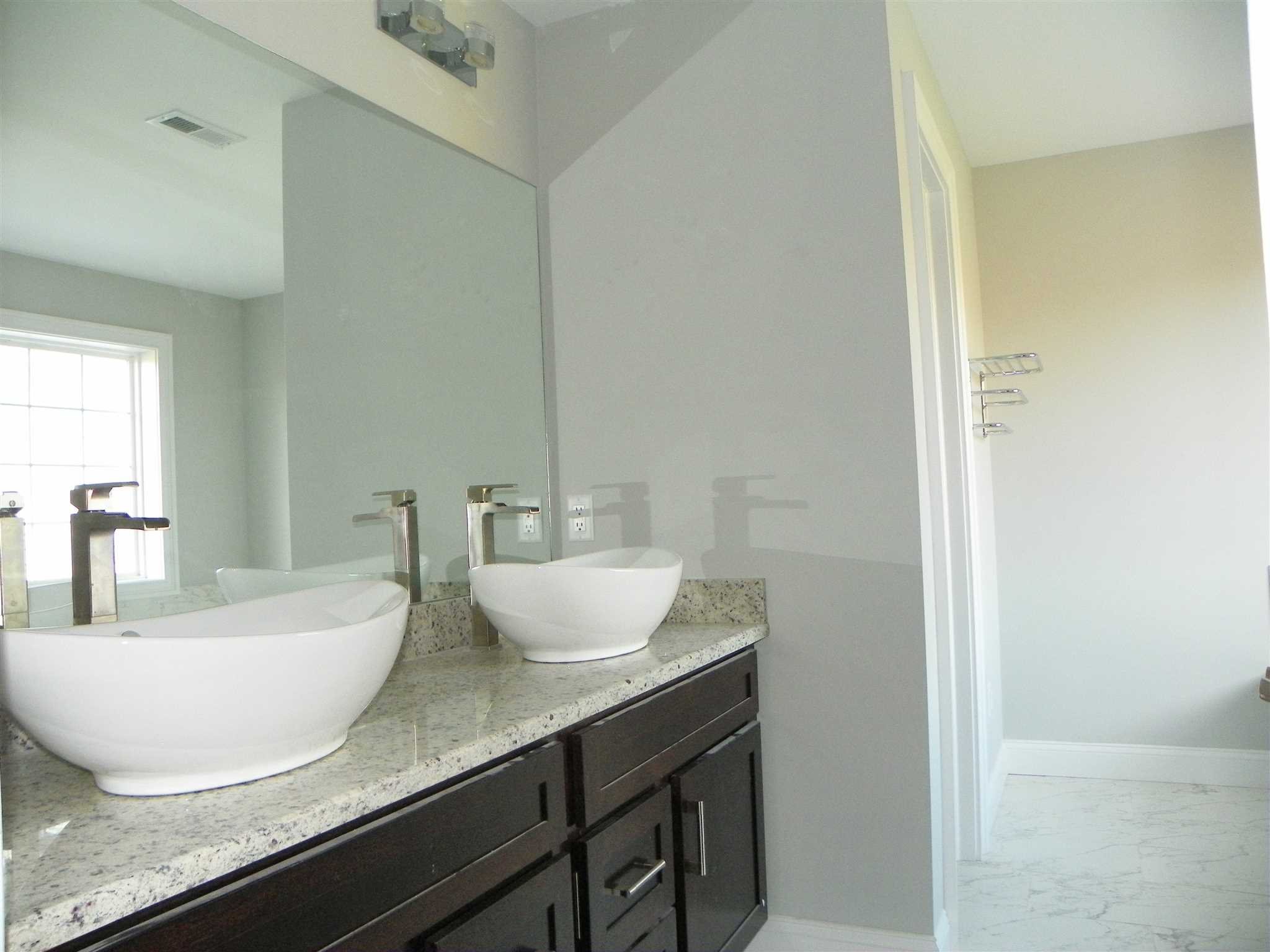 2 Lincoln Square Road Fishkill, NY 12524 - Photo 15 of 18 a view of a bathroom with a granite countertop sink and a mirror