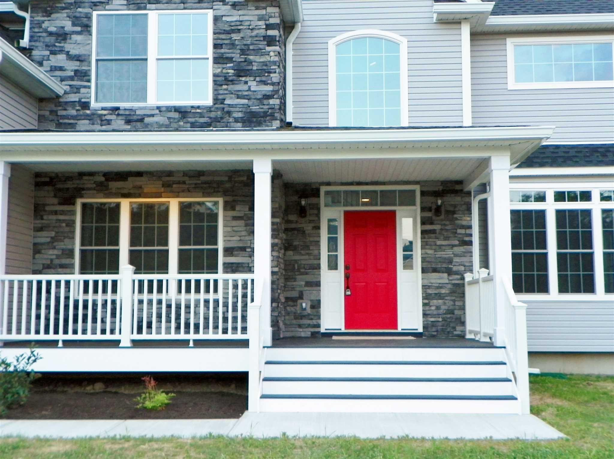 2 Lincoln Square Road Fishkill, NY 12524 - Photo 3 of 18 a view of a house with a small deck and a large window