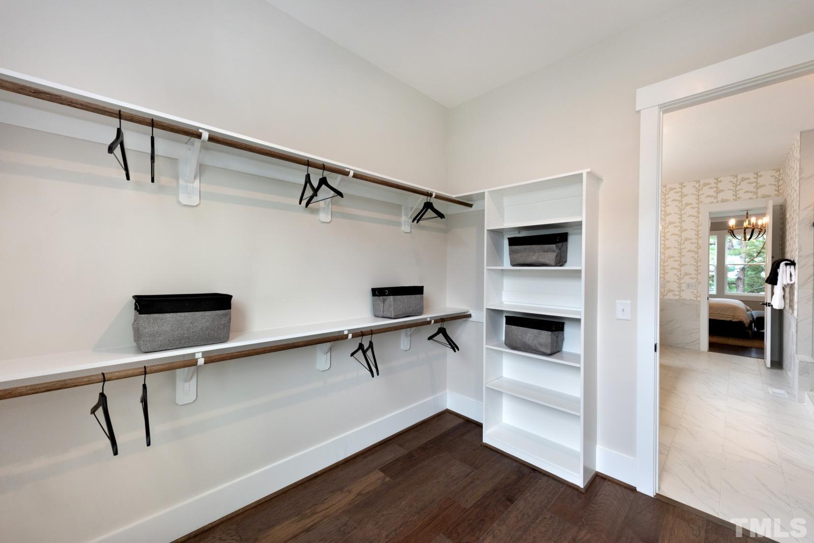 27 E Spring Angier, NC 27501 - Photo 17 of 35 a view of a hallway with a table and chairs