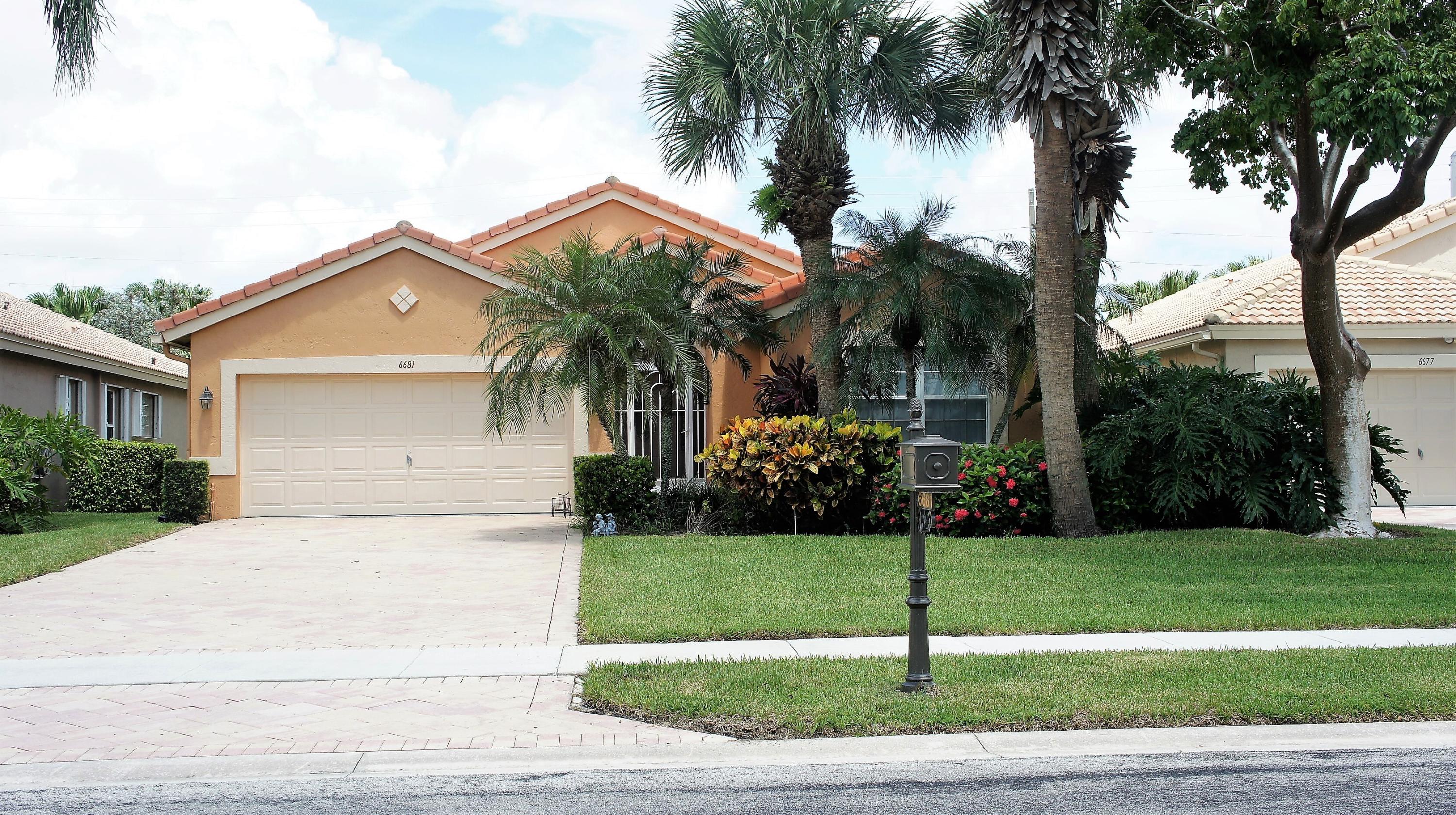 6681 Sun River Road Boynton Beach, FL 33437 - Photo 1 of 28 Front