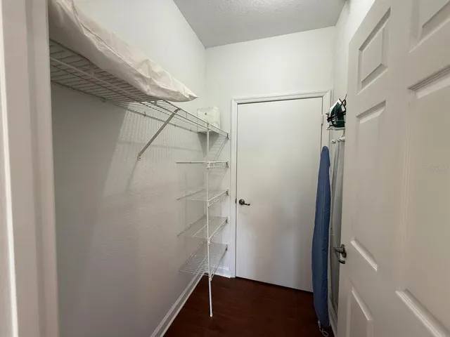 a view of a room with rack on the wall