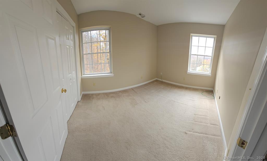 165 Osborn Road Naugatuck, CT 06770 - Photo 13 of 23 an empty room with windows
