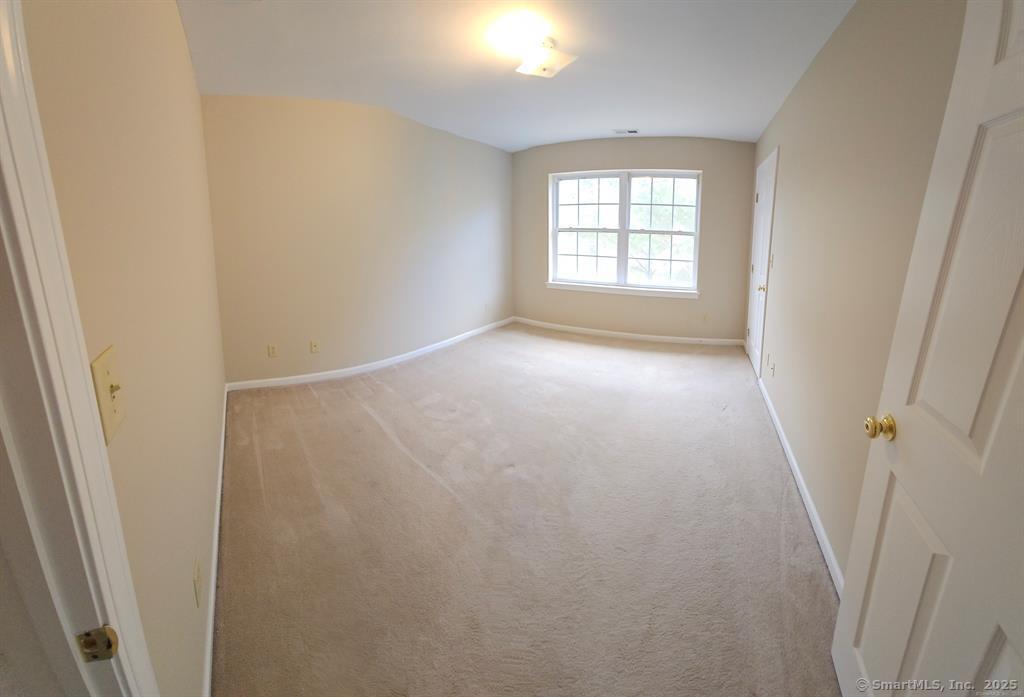 165 Osborn Road Naugatuck, CT 06770 - Photo 18 of 23 an empty room with windows