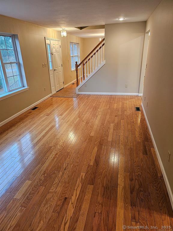 165 Osborn Road Naugatuck, CT 06770 - Photo 5 of 23 a view of an entryway with wooden floor
