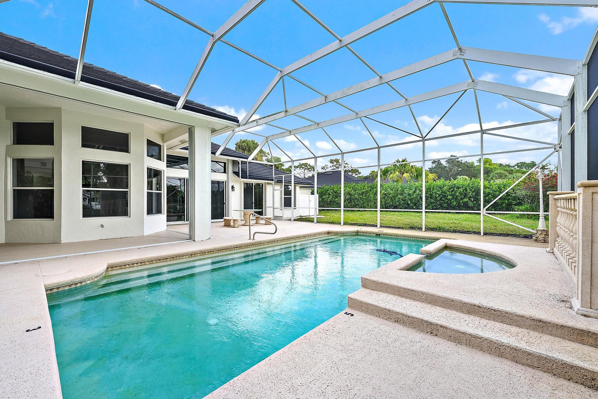 19558 Red Gum Trail Jupiter, FL 33458 - Photo 26 of 34 a view of swimming pool with seating area