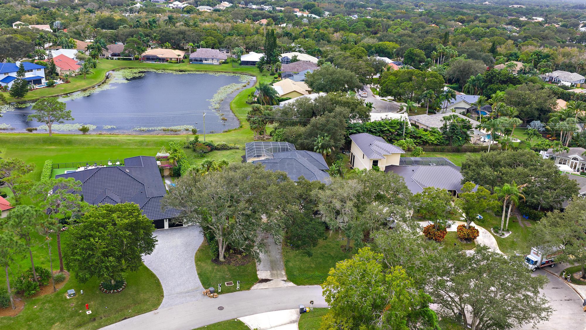 19558 Red Gum Trail Jupiter, FL 33458 - Photo 31 of 34 an aerial view of multiple house