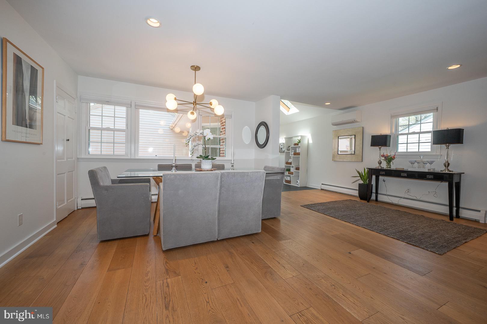 621 Vassar Road Wayne, PA 19087 - Photo 13 of 37 a living room with furniture and a chandelier