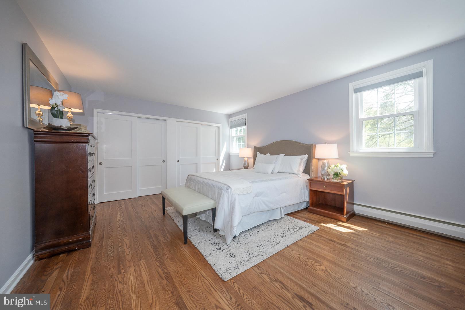 621 Vassar Road Wayne, PA 19087 - Photo 22 of 37 a bedroom with a bed and wooden floor