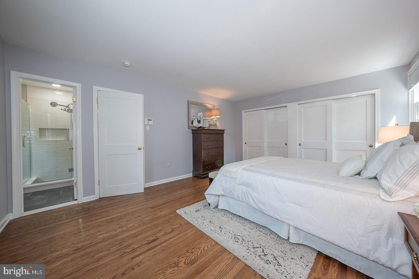 621 Vassar Road Wayne, PA 19087 - Photo 24 of 37 a spacious bedroom with a bed and a refrigerator
