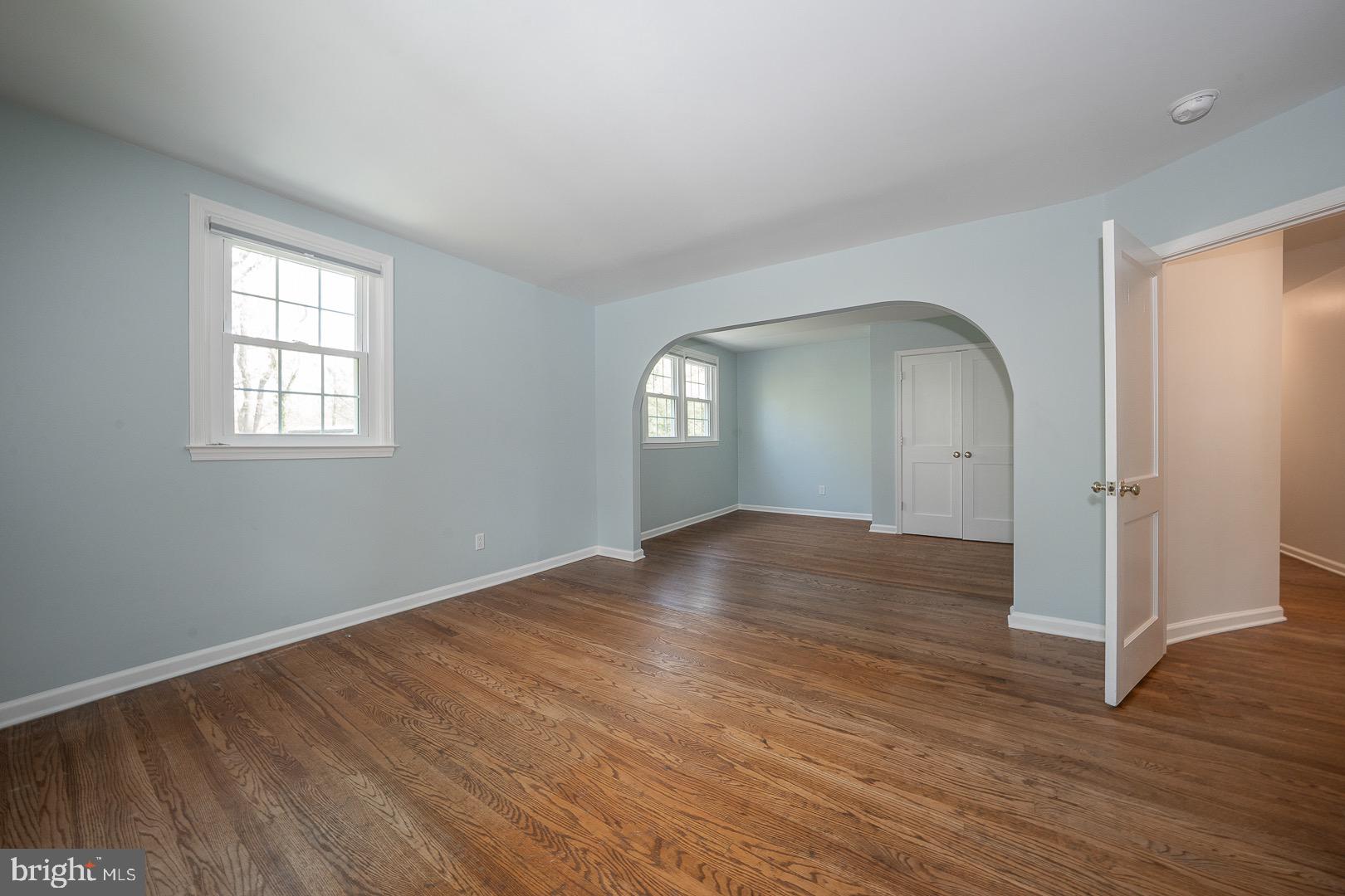 621 Vassar Road Wayne, PA 19087 - Photo 27 of 37 an empty room with wooden floor and window