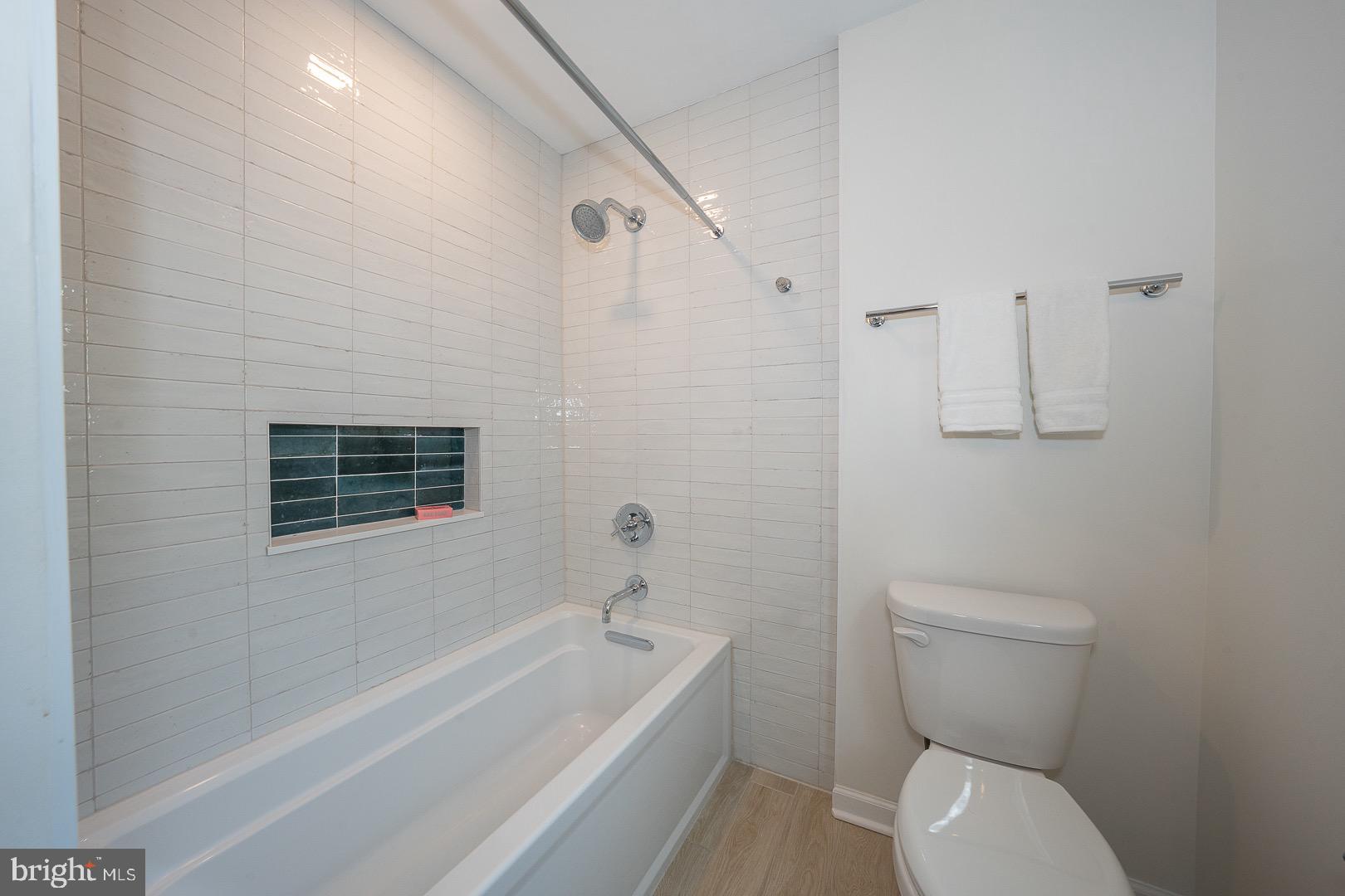 621 Vassar Road Wayne, PA 19087 - Photo 30 of 37 a bathroom with a toilet a sink and bathtub