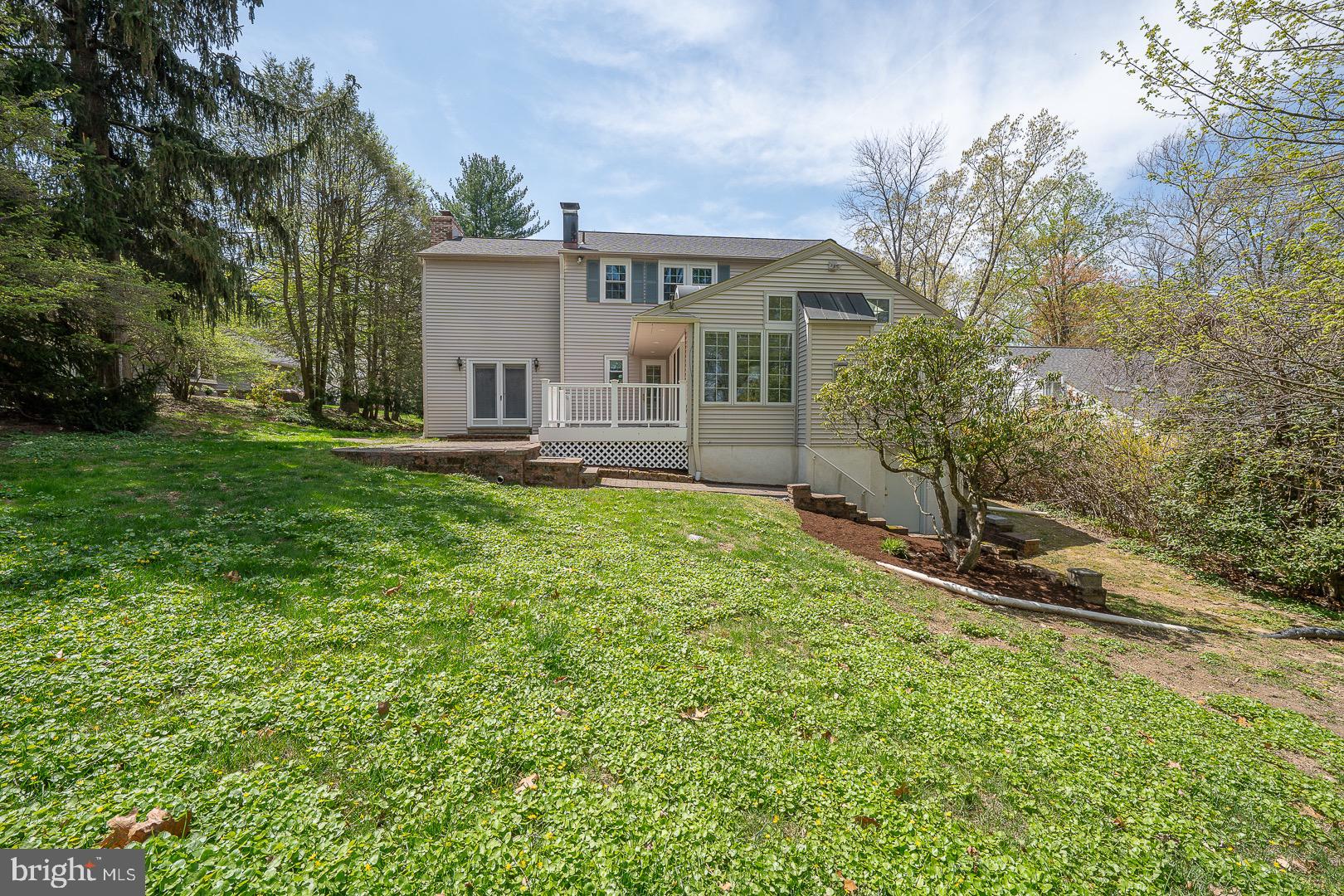 621 Vassar Road Wayne, PA 19087 - Photo 36 of 37 front view of a house with a yard