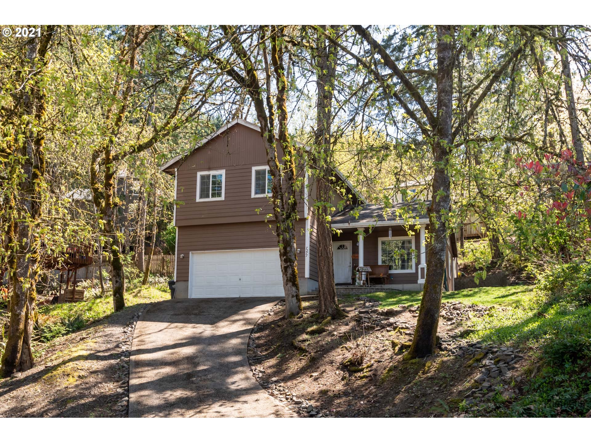 7277 Forsythia Street Springfield, OR 97478 - Photo 2 of 29 a view of a house with a yard