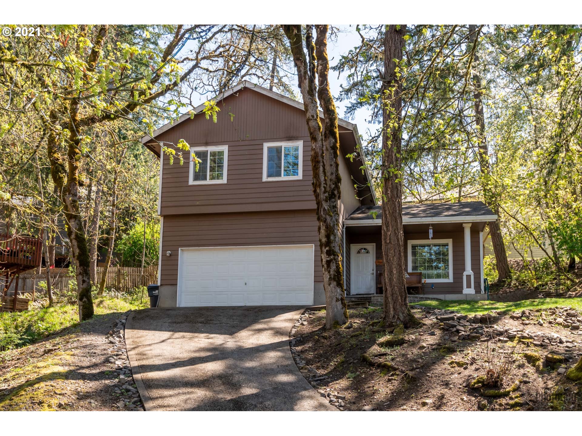 7277 Forsythia Street Springfield, OR 97478 - Photo 4 of 29 a front view of a house with a yard