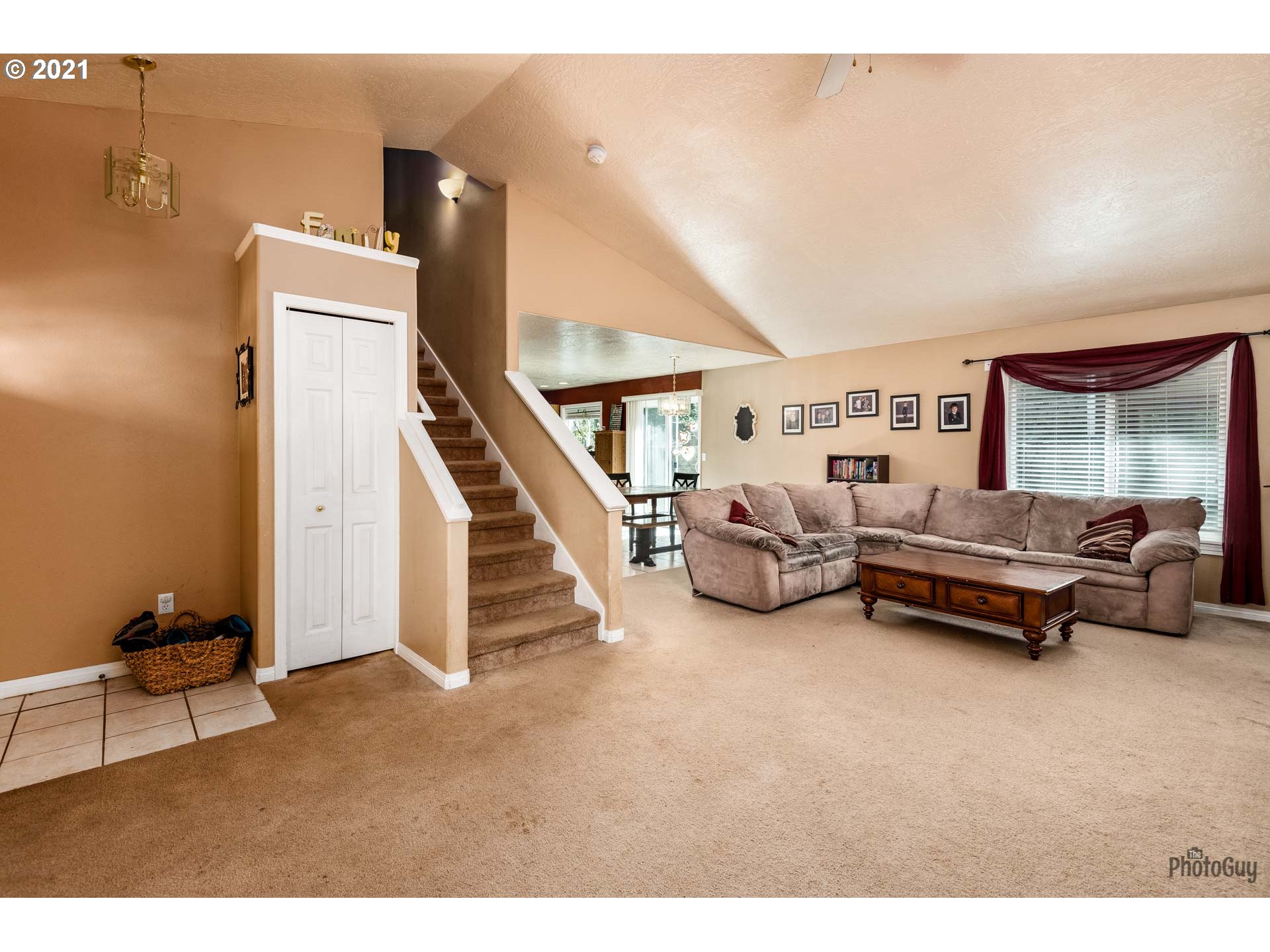 7277 Forsythia Street Springfield, OR 97478 - Photo 9 of 29 a living room with furniture and a gym