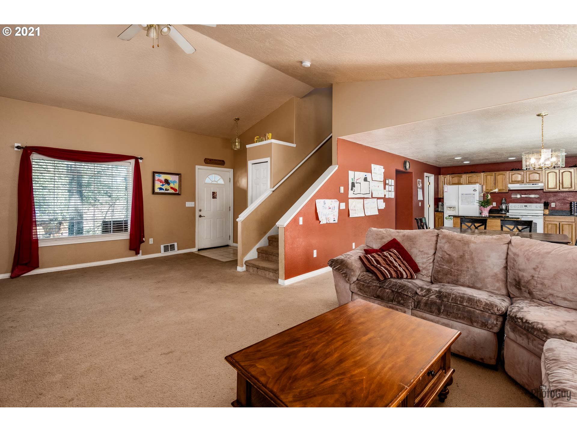 7277 Forsythia Street Springfield, OR 97478 - Photo 10 of 29 a living room with furniture and a wooden floor