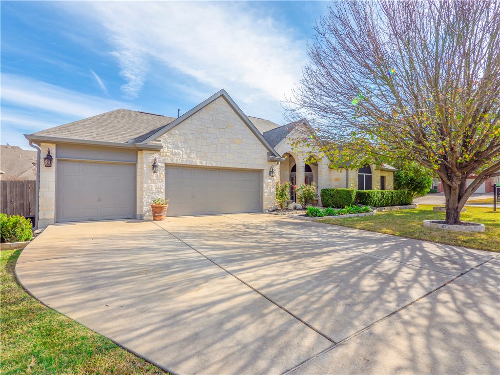 1527 Foppiano Loop Round Rock, TX 78665 - Photo 1 of 1 a view of a house with a yard and garage
