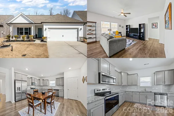a kitchen with stainless steel appliances kitchen island granite countertop a stove and cabinets