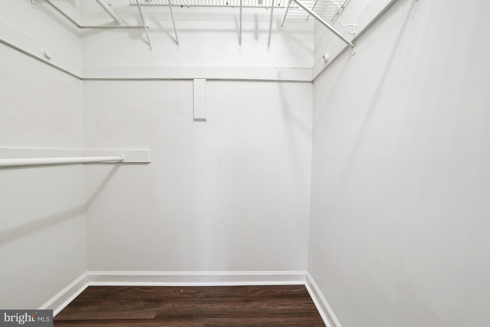 4905 29th Road South, Unit B1 Arlington, VA 22206 - Photo 19 of 52 a view of a room with racks on the wall