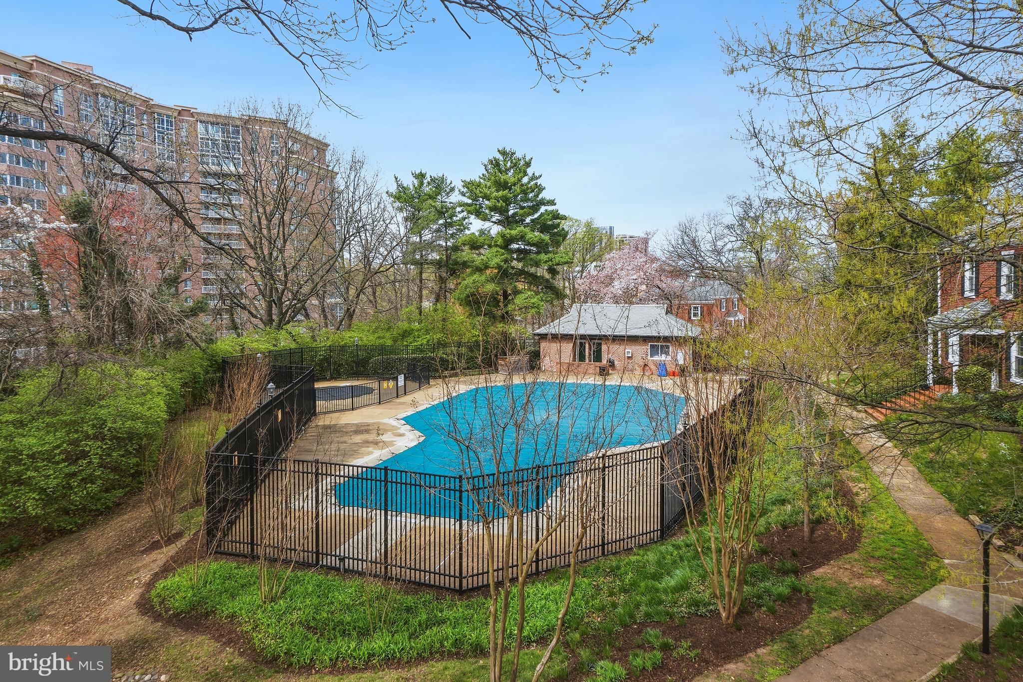 4905 29th Road South, Unit B1 Arlington, VA 22206 - Photo 26 of 52 a view of a swimming pool with a patio