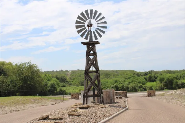 a view of an empty space and mountain view