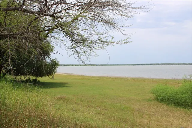a view of a road with a yard