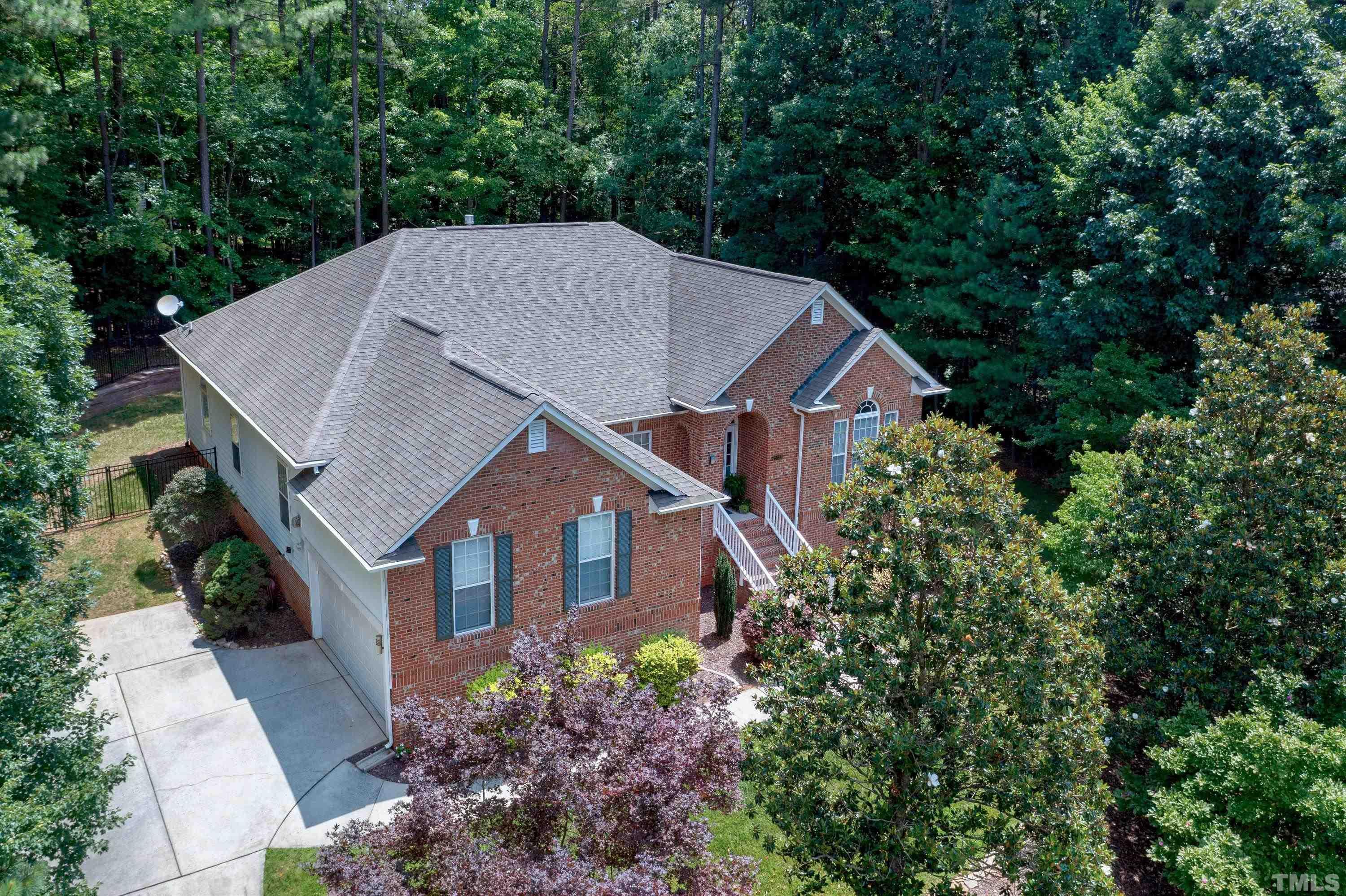 5033 Bartons Enclave Lane Raleigh, NC 27613 - Photo 53 of 58 a house view with a outdoor space