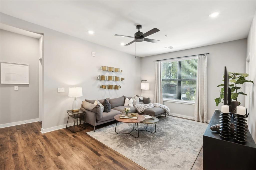 2201 Northwest Federal Highway, Unit 3B1209 Stuart, FL 34994 - Photo 7 of 47 a living room with furniture and a window