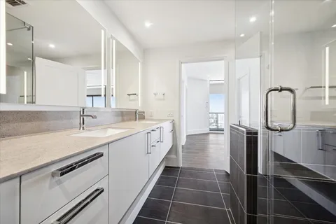 a living room with fireplace furniture and a flat screen tv