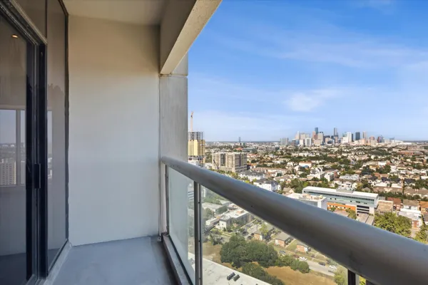 a view of a city from a balcony