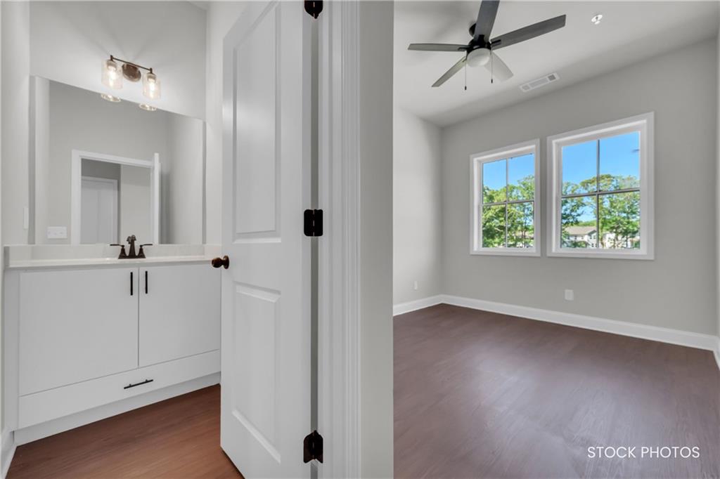 1038 Homestead Way Street Dacula, GA 30019 - Photo 21 of 36 a view of an empty room with a window