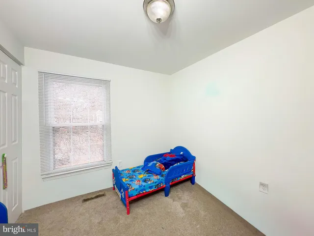 a room with toys and a window