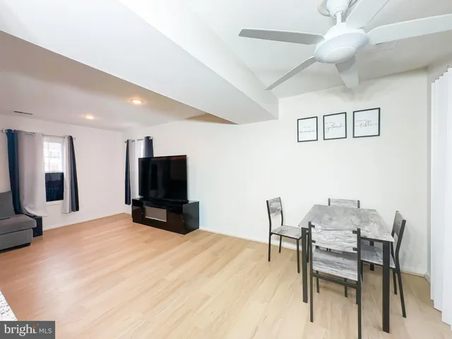 a room with a bed and a chair in it