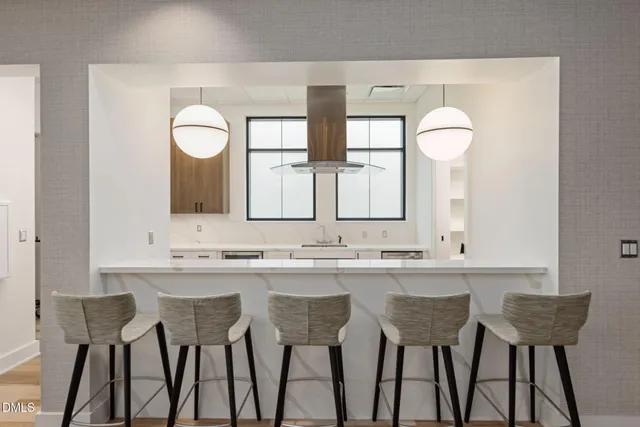 a view of a dining room and chairs