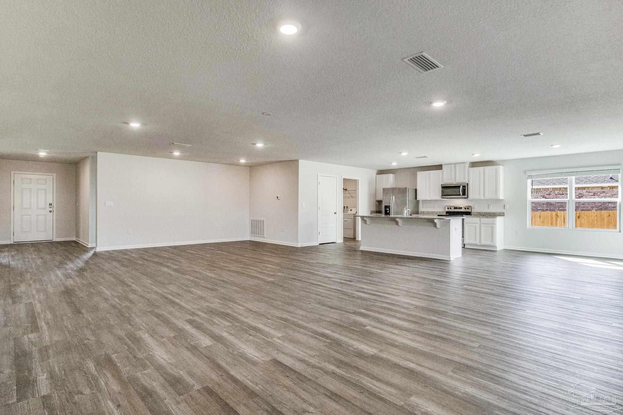 9823 MilleeLoop Loop Pensacola, FL 32526 - Photo 12 of 50 a view of kitchen with furniture and wooden floor