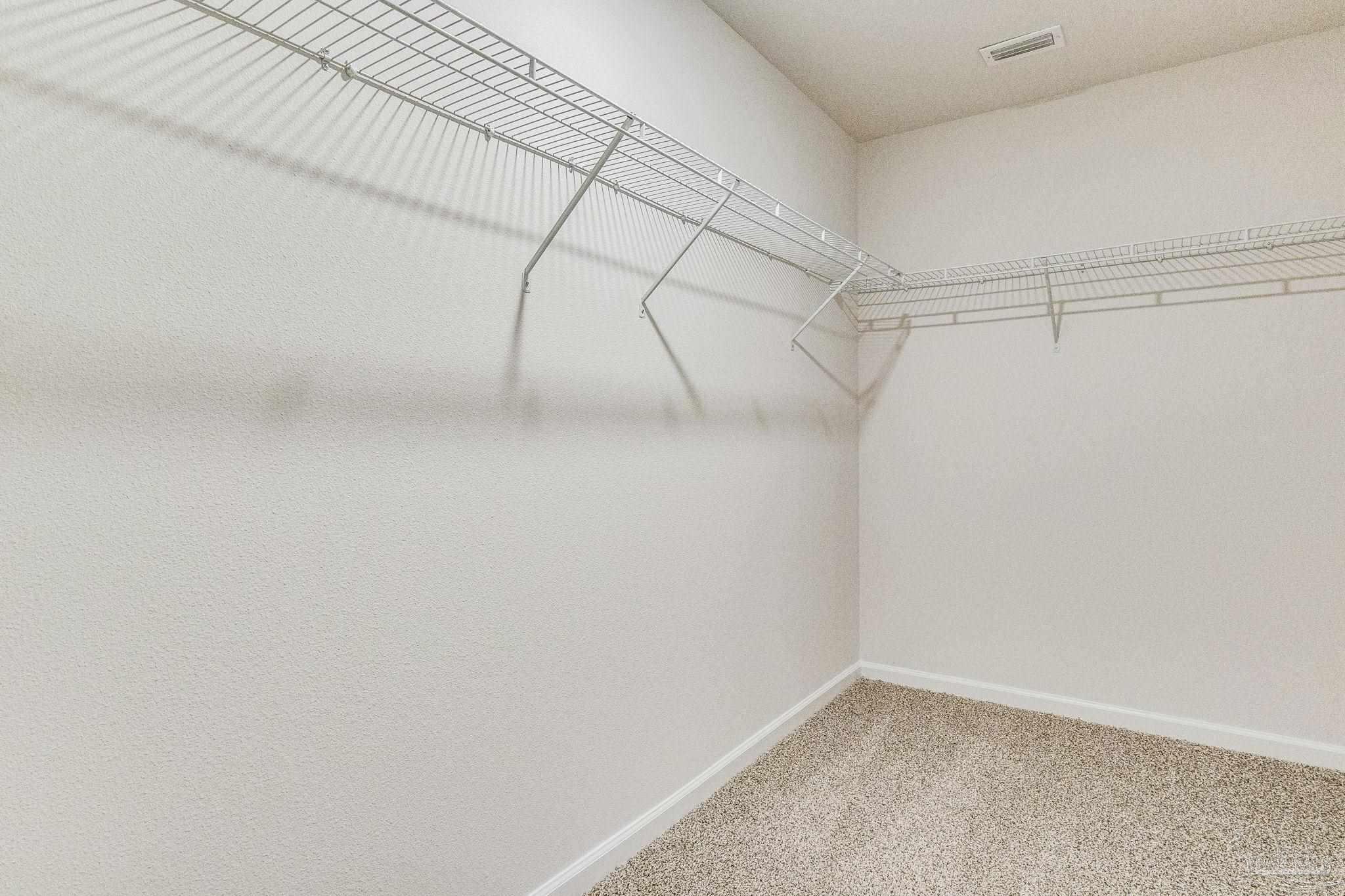 9823 MilleeLoop Loop Pensacola, FL 32526 - Photo 23 of 50 a view of a room with racks on the wall