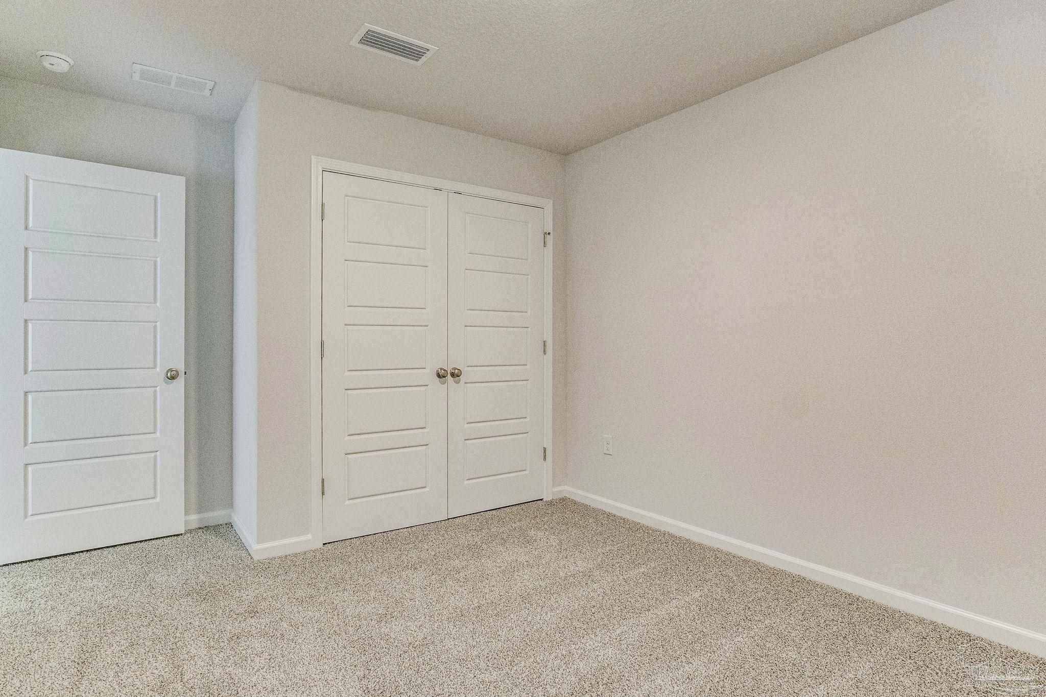 9823 MilleeLoop Loop Pensacola, FL 32526 - Photo 27 of 50 an empty room with closet area