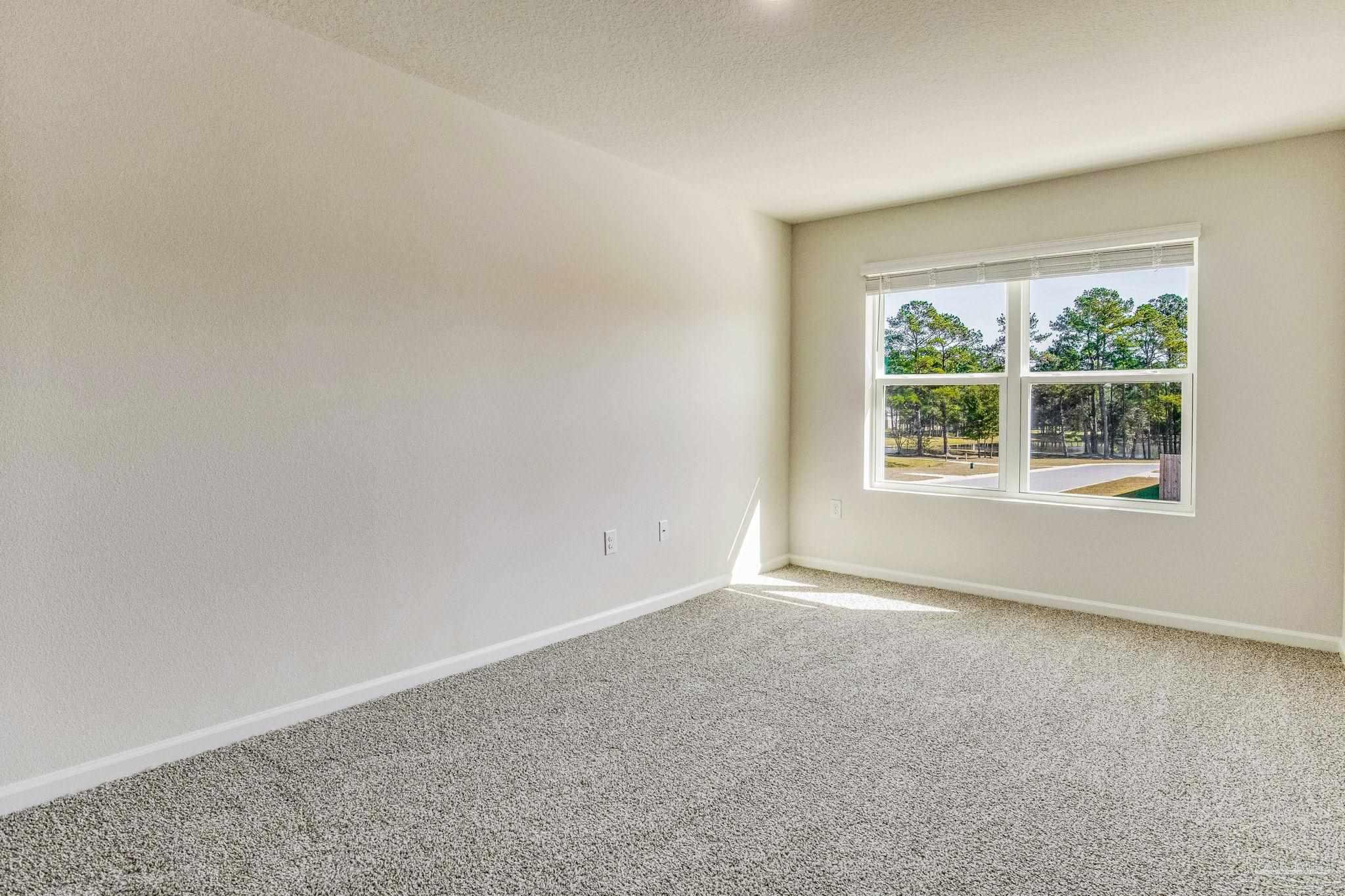 9823 MilleeLoop Loop Pensacola, FL 32526 - Photo 30 of 50 an empty room with windows