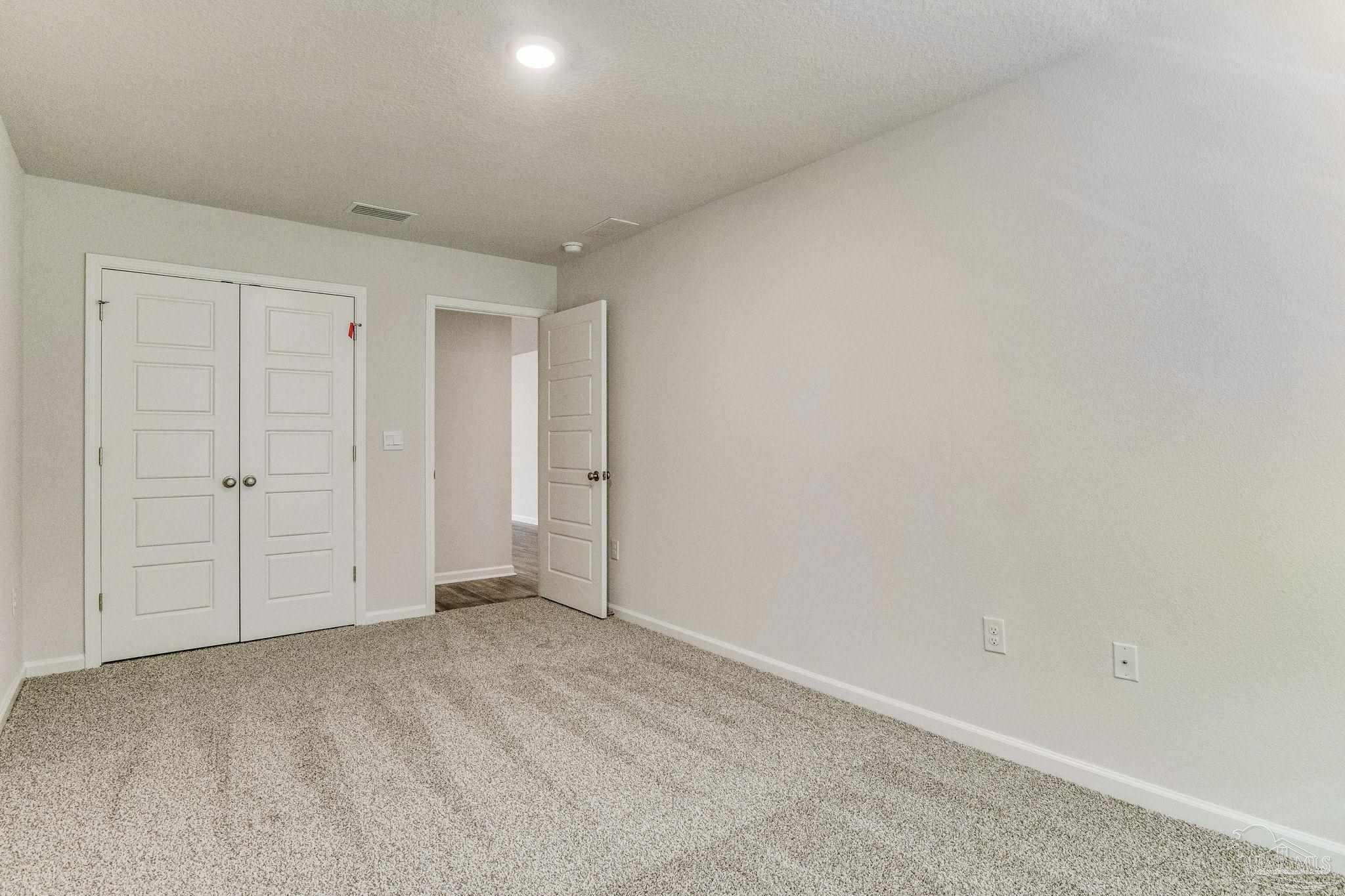 9823 MilleeLoop Loop Pensacola, FL 32526 - Photo 31 of 50 a view of an empty room