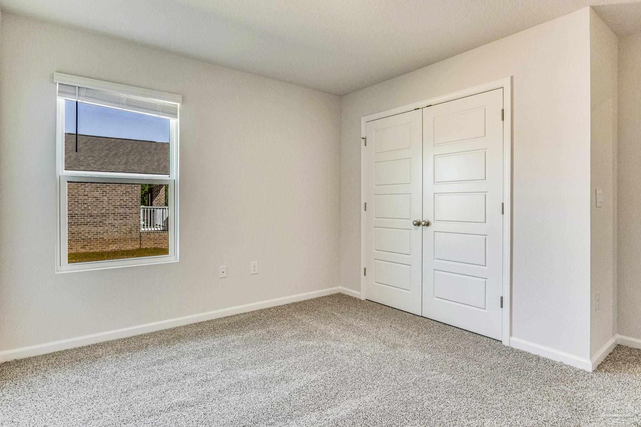 9823 MilleeLoop Loop Pensacola, FL 32526 - Photo 36 of 50 an empty room with windows