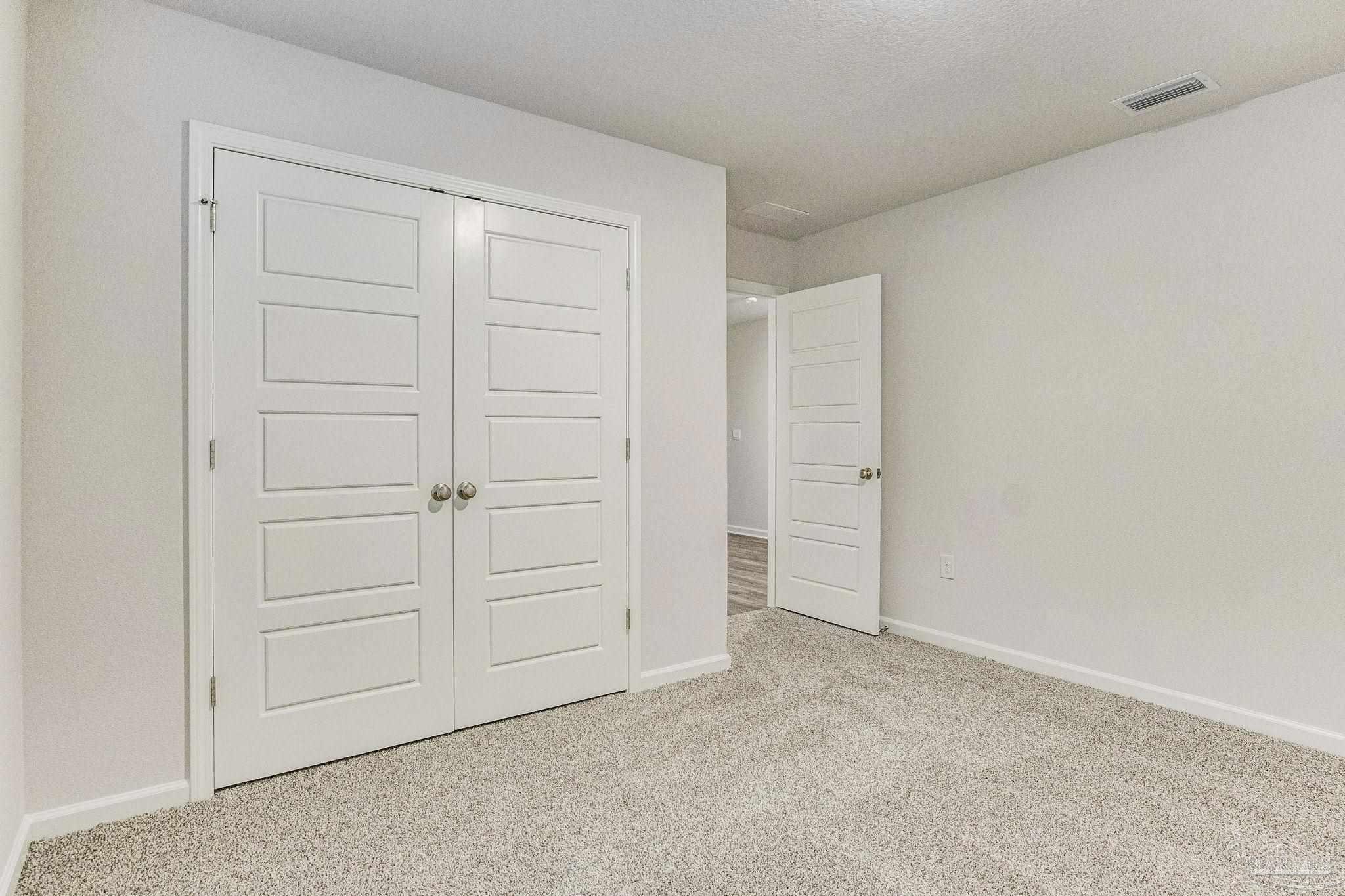 9823 MilleeLoop Loop Pensacola, FL 32526 - Photo 37 of 50 an empty room with closet area