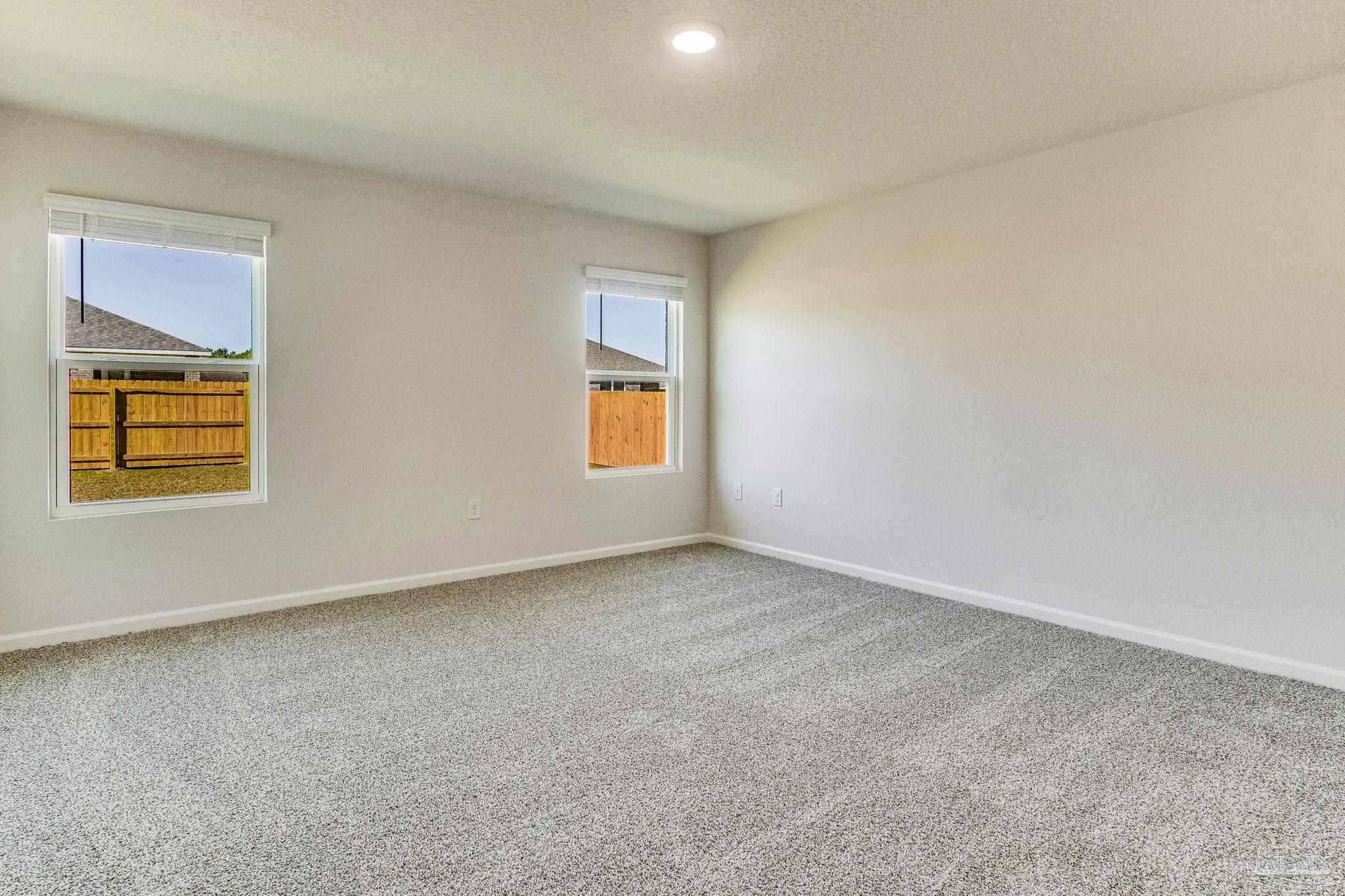 9823 MilleeLoop Loop Pensacola, FL 32526 - Photo 38 of 50 an empty room with windows